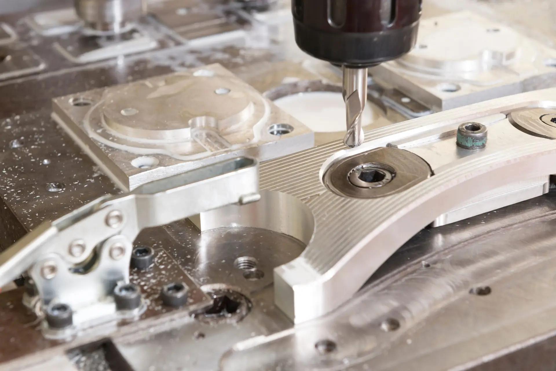 Precision CNC milling machine cutting a custom aluminum component for industrial manufacturing applications